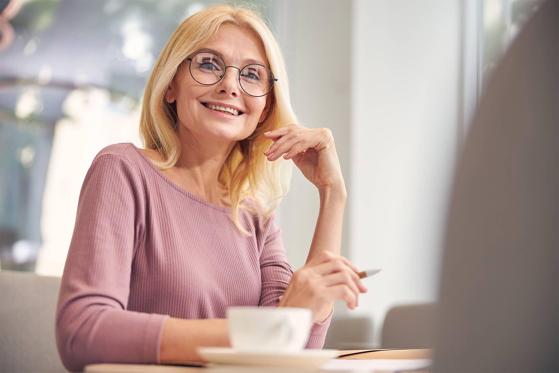 positive-delighted-mature-woman-looking-at.jpg